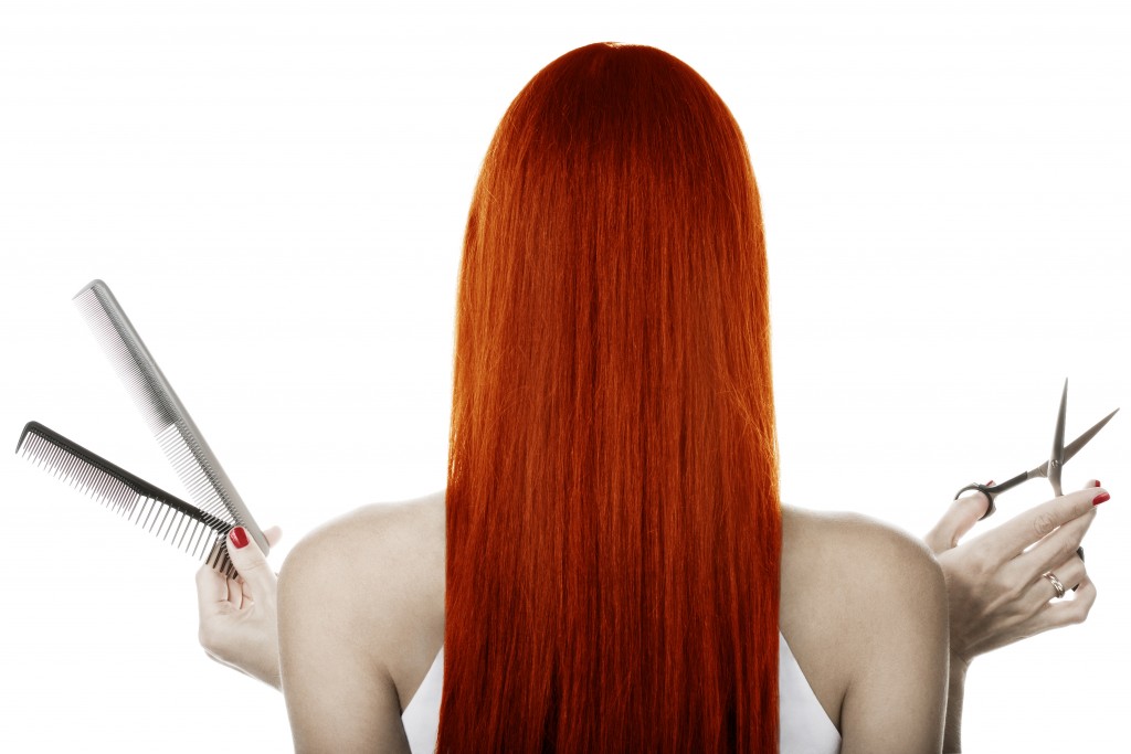 Red hair and hairdresser's tools